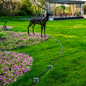 Twinkle Star easy-install spike penetrates turf for quick hose placement.
