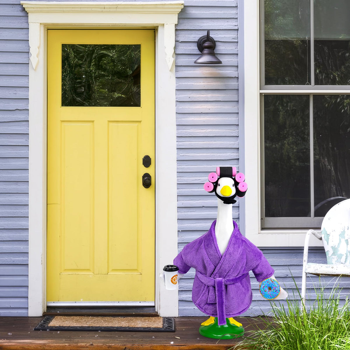 Ueyben Goose Costume in vibrant purple fabric for outdoor display