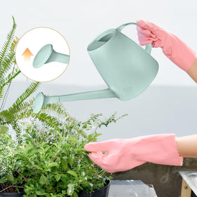 UFANME watering can outdoors-ready for balcony gardens.