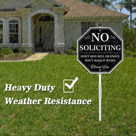 Uflashmi yard sign mounted on stake in outdoor garden setting