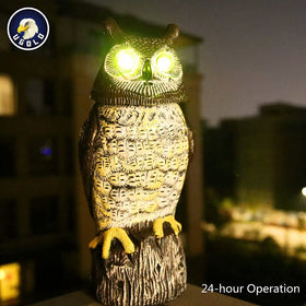 Ugold weatherproof garden owl withstands rain and snow for year-round display