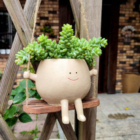 UMESONG hanging face pot with string of pearls ready for arrangement.