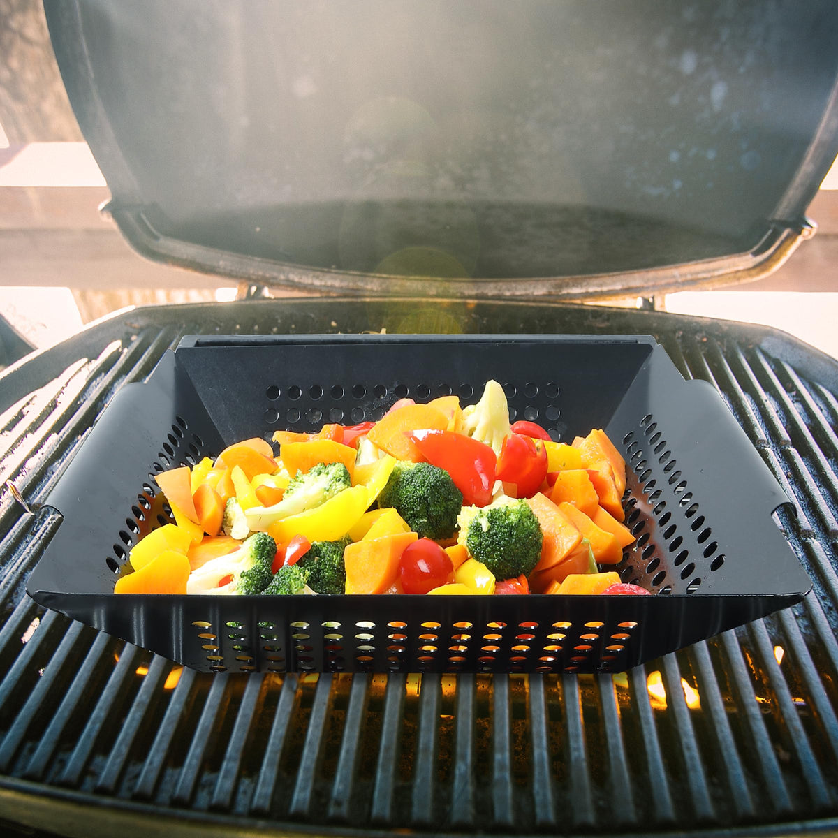 UNCO grill basket durable stainless steel for long-lasting use.