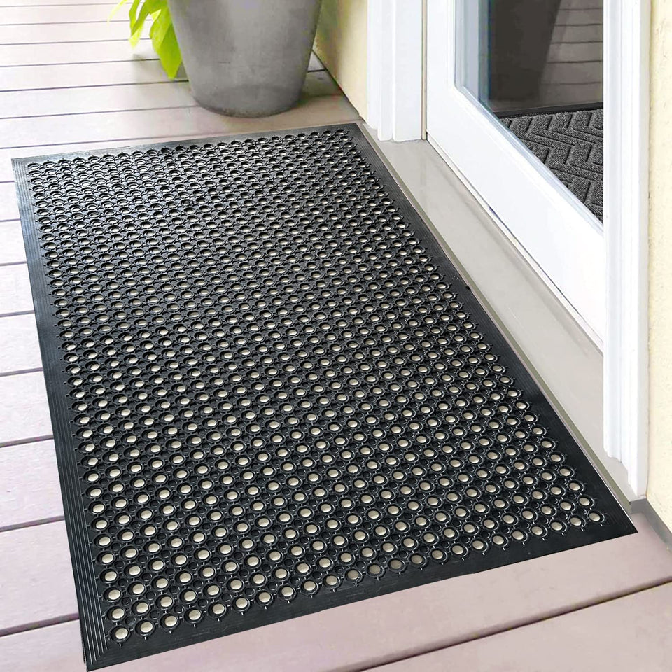 Uniboho outdoor rubber floor mat with anti-slip texture for safer entry in rain.