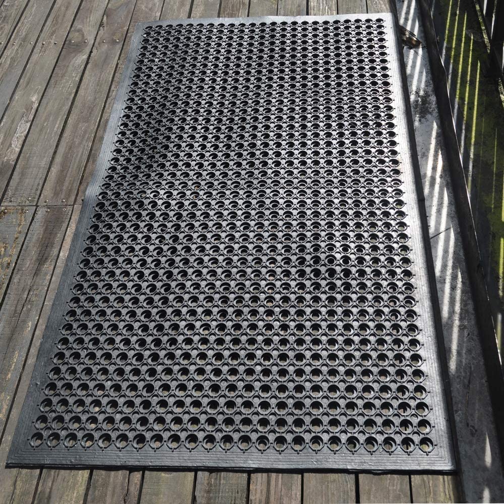 Uniboho pool-side mat drains water to keep surrounding surfaces dry.