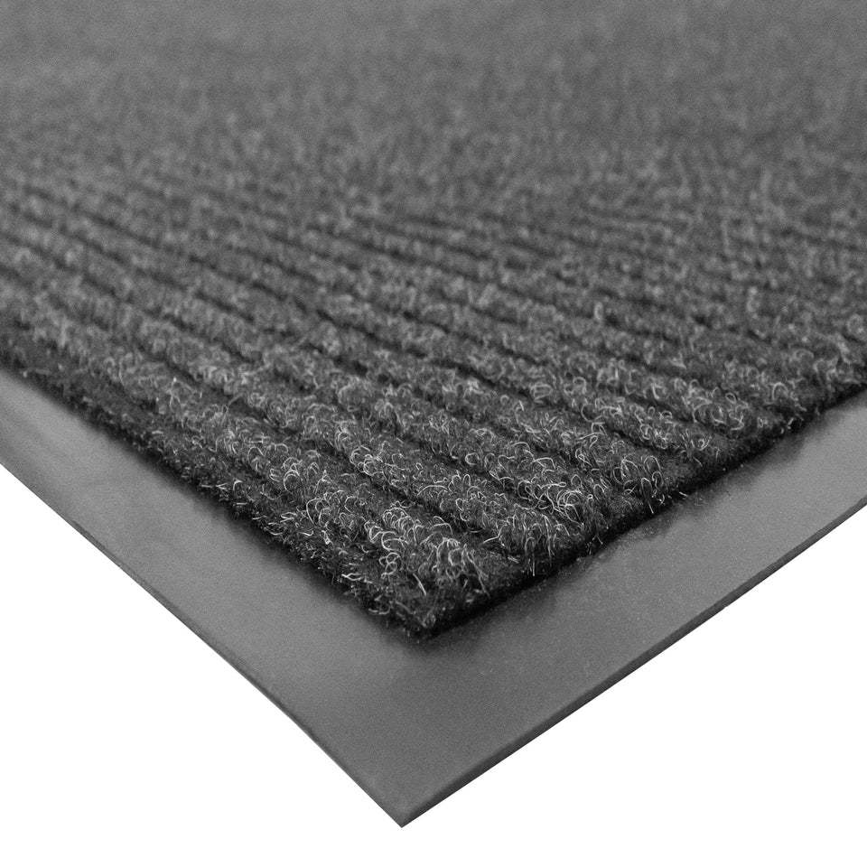 UNIMAT Traffic Guard 3x5 door mat with ribbed surface traps moisture and debris.