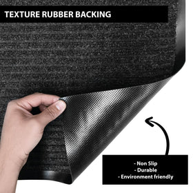 UNIMAT Traffic Guard ribbed entrance mat showing dirt-scraping grooves.
