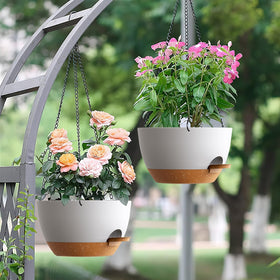 UOUZ 10-inch self-watering planter in white and brown for modern spaces.