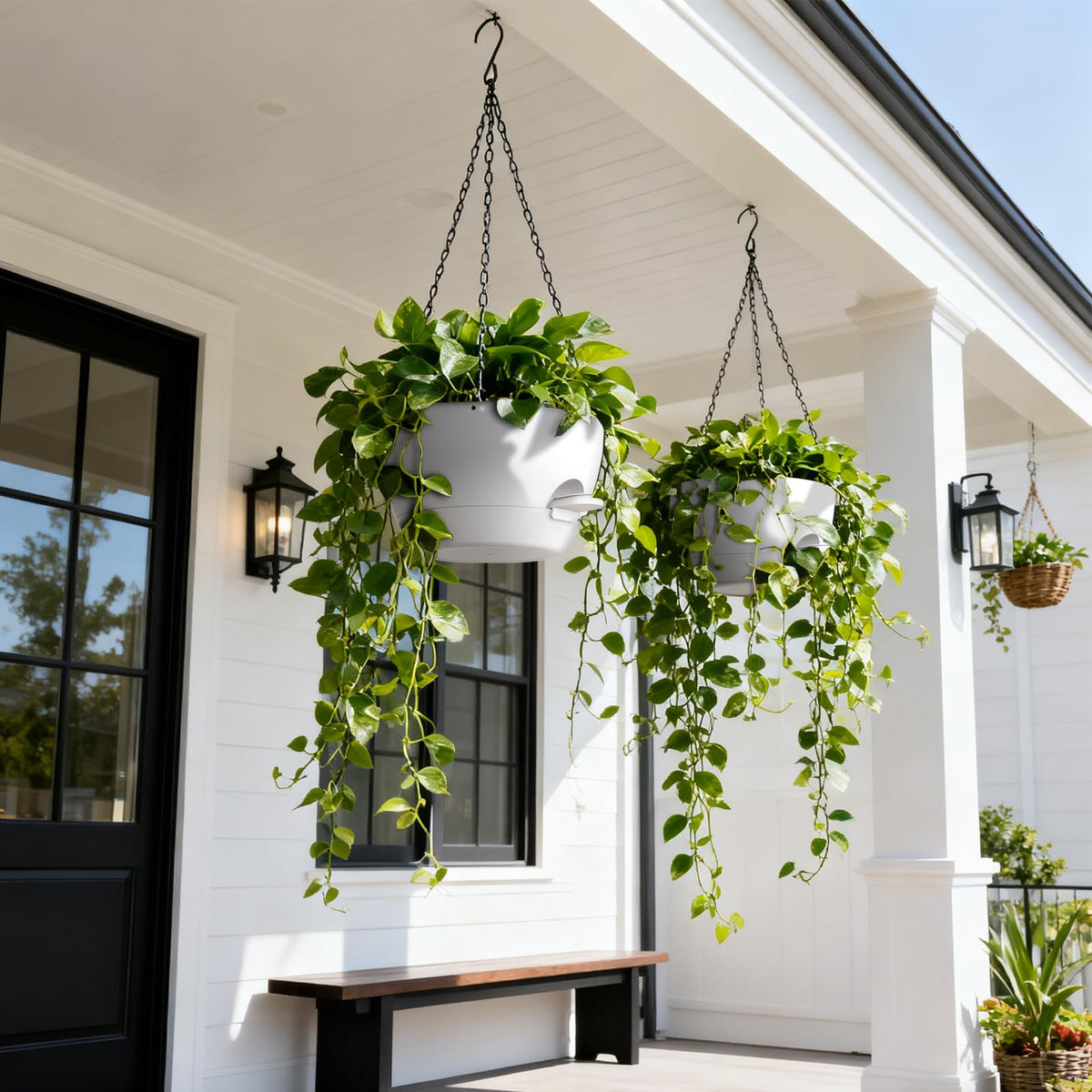 UOUZ two-pack white planters provide stylish outdoor-ready hanging decor.