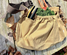 UpBloom berry-picker usage shows hands-free harvesting with convenient pockets
