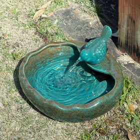 UPSJYJ ceramic solar bird bath front view attracts birds with elegant design