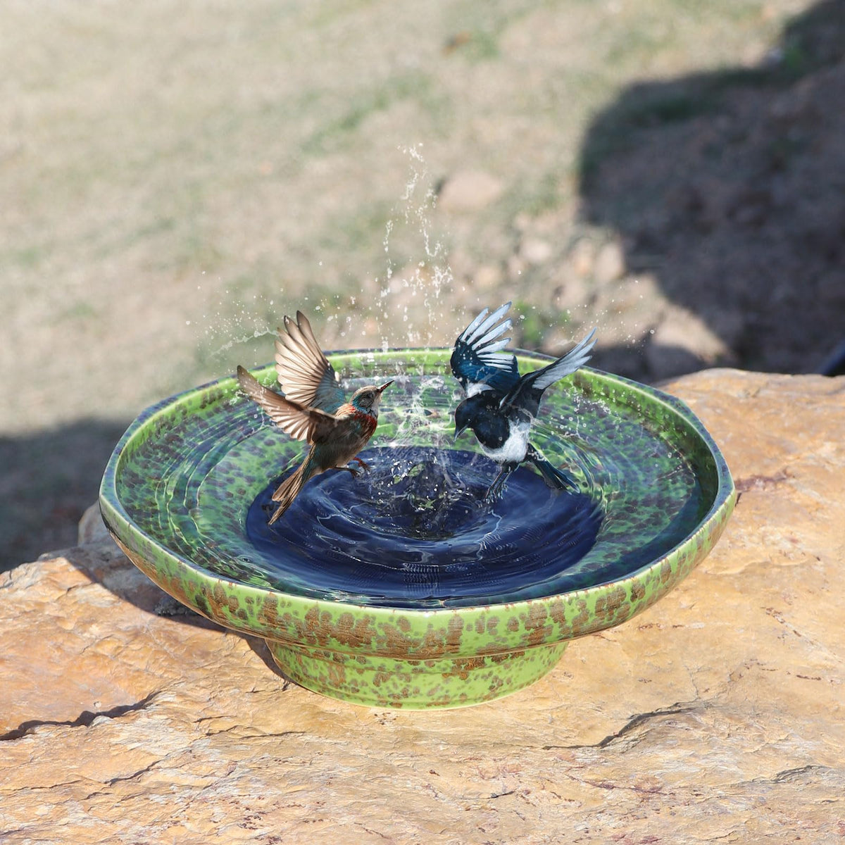 UPSJYJ bird bath with solar fountain on the deck creates a tranquil water feature