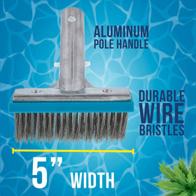 Brush head scrubbing tiles and grout in pool setting.
