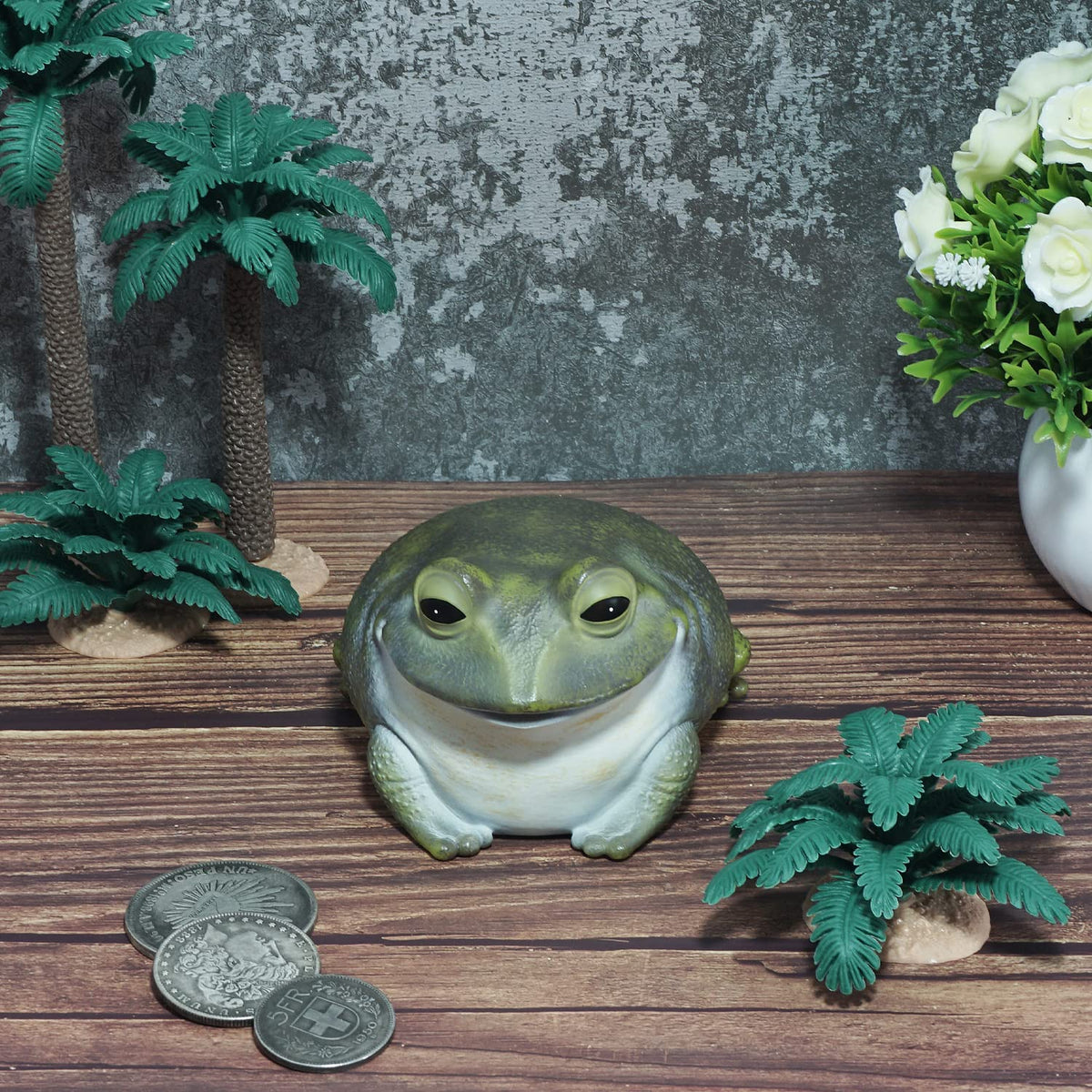 USEAMIE spare key hider frog open compartment for small items.