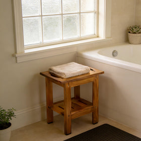 Utoplike teak shower stool close-up highlights durable plantation teak.