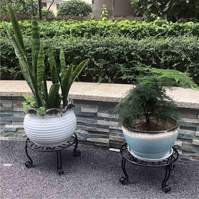 Uuuda set of 2 stands designed for indoor or outdoor placement