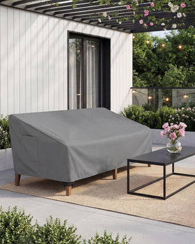 Vailge grey 3-seater cover blends with patio aesthetics while shielding elements