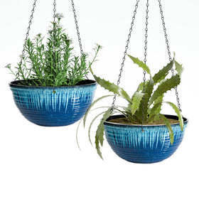 Vanslogreen 12-inch planter with blue flow glaze for indoor display.