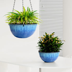 Vanslogreen glazed-detail hanging planter enhances modern garden spaces.