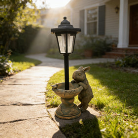 Vasesun 15.8-inch bunny lantern statue creates yard focal point.