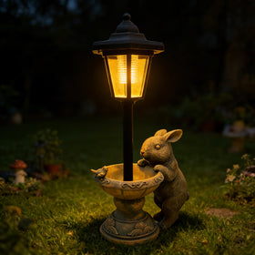 Vasesun solar rabbit garden statue lantern adds ambient night lighting.