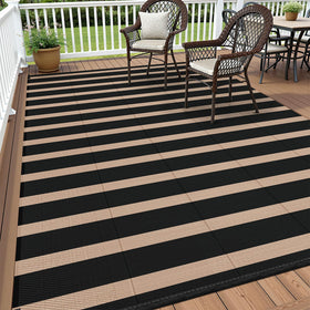 Vaukki waterproof outdoor rug 5x8 with stripes, great for patios and camps.