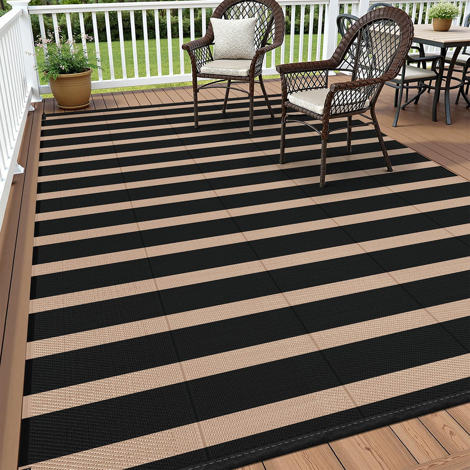 Vaukki waterproof outdoor rug 5x8 with stripes, great for patios and camps.