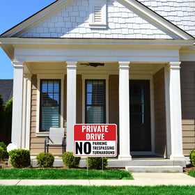 Venicor set of two signs with stakes installed in a yard for clear access.