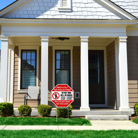 Venicor two-sign setup demonstrated in a driveway for practical yard use.