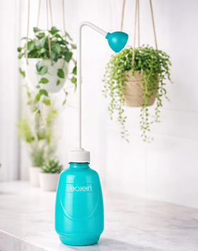 VEOJEIN ergonomic grip bottle provides comfortable handling while watering.