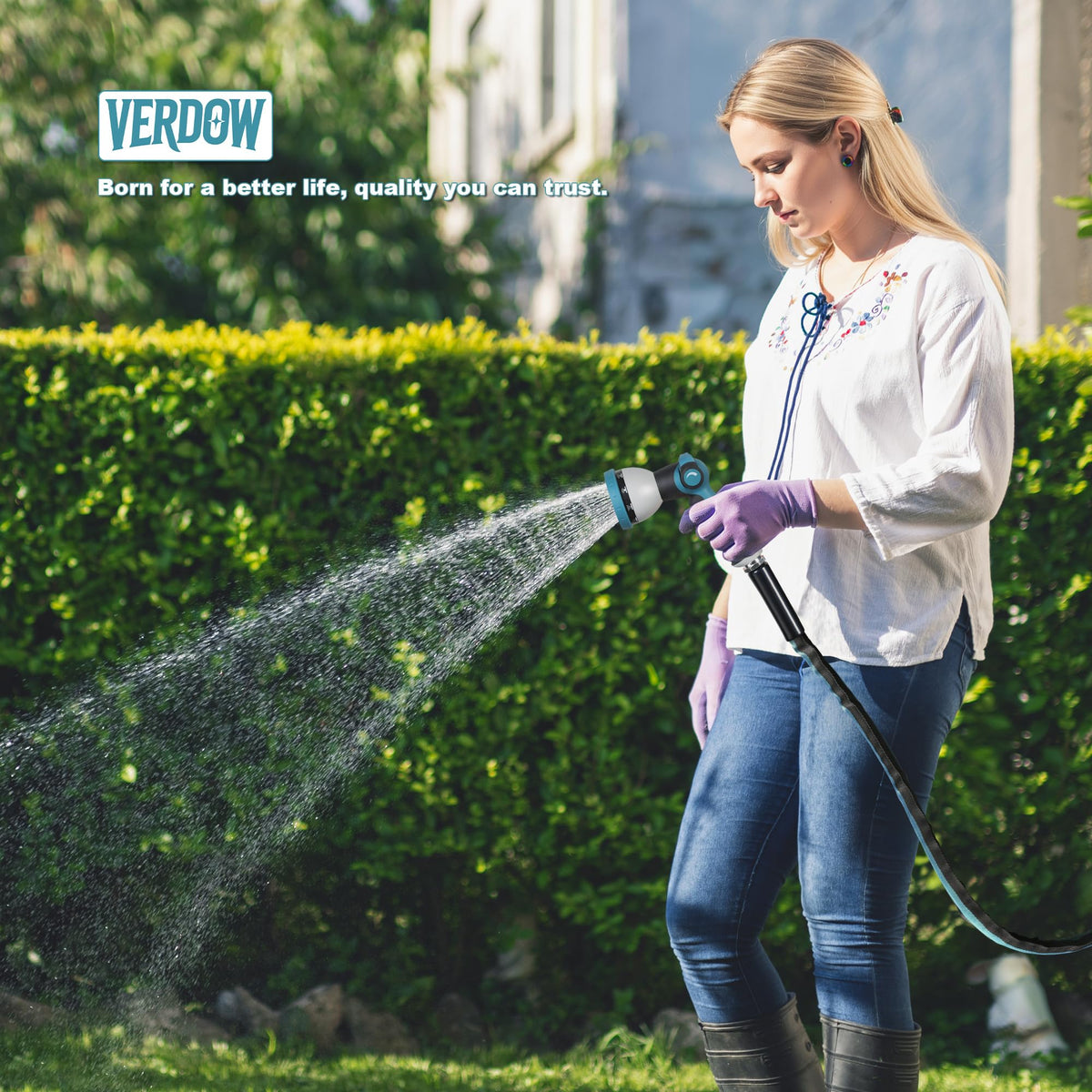 VERDOW hose being used for car wash and outdoor cleaning with steady spray.