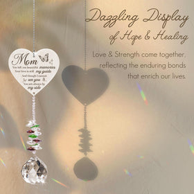 Vetbuosa hanging crystal suncatcher ready to display in a sunny window.