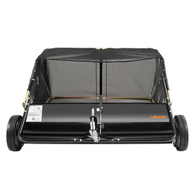 VEVOR Tow Behind Lawn Sweeper in a large yard suitable for farms and big spaces.
