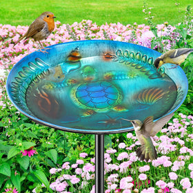 VeyFolzin.st metal bird bath in blue enhances outdoor decor and attracts birds.