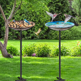 VeyFolzin.st outdoor bird bath in action with birds visiting the water.