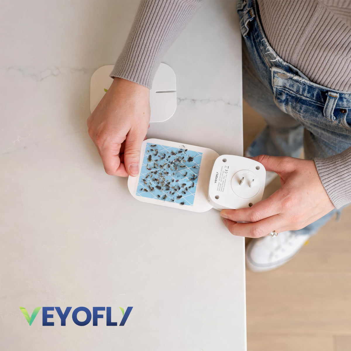 VEYOFLY fruit fly trap indoors captures fruit flies near counters and sinks.