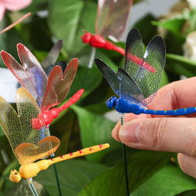 VGOODALL dragonfly stake yellow pack highlights garden corners at dusk.