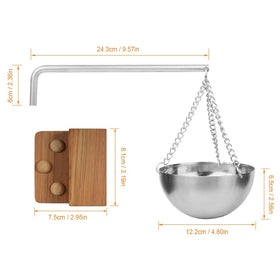 Vindar sauna oil cup with swing arm ready to heat over sauna rocks.