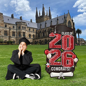 Outdoor graduation decor by Vivantia 2026 yard sign on lawn