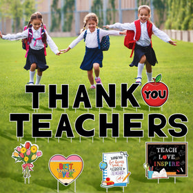 Vivantia book page sign reinforces classroom themes outdoors.