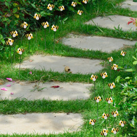 VIVIANYO HD bee garden stake along pathways enhances garden beds.