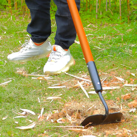 VNIMTI weed control tool in action for fast shallow-rooted weed removal.