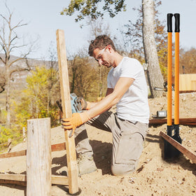 Non-slip grip on VNIMTI post hole digger for secure handling.