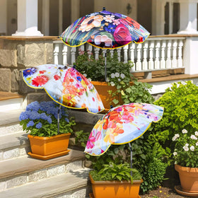 Voccos three-pack flower plant umbrellas neatly set up in a garden, easy ground anchoring.