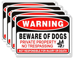 Voiluk 4-pack beware of dog signs on a fence with reflective surface for clear visibility.