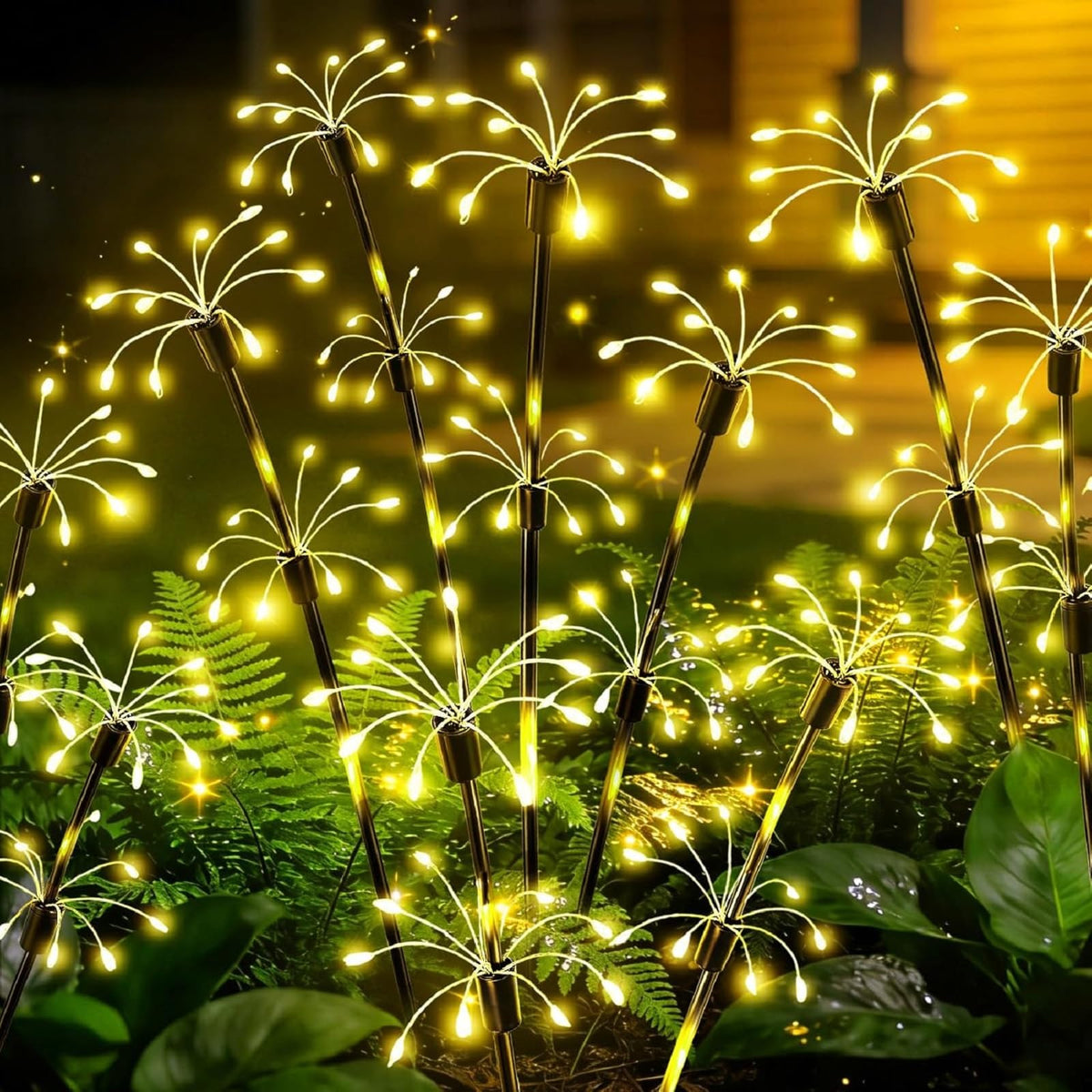 VOOKRY solar garden lights illuminate outdoor pathways with a bright, layered firework design.