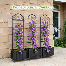 VOXOR trellis installed in soil within a garden bed for stability.