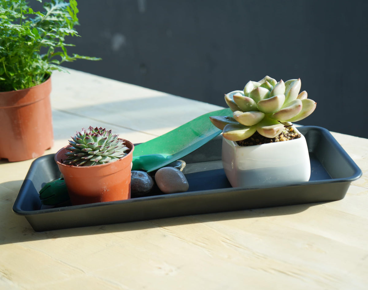 VUWEZ water drip tray prevents spills and surface damage