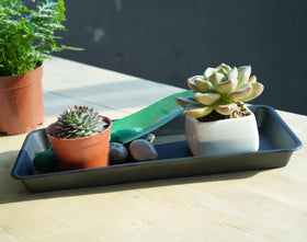 VUWEZ water drip tray prevents spills and surface damage