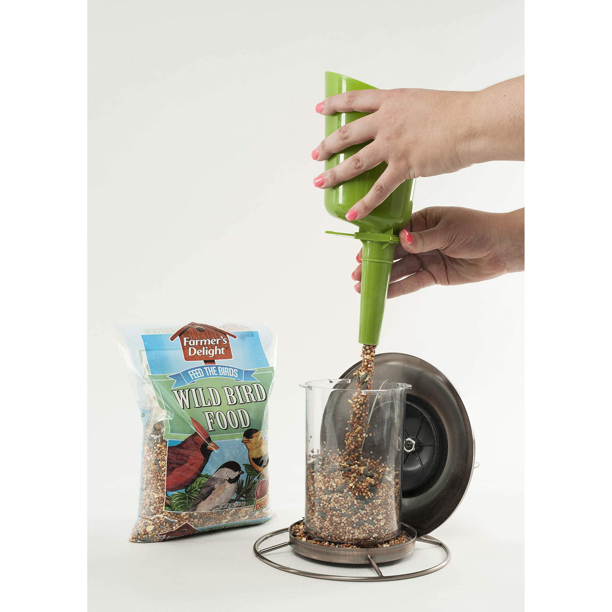 Wagner's Farmer's Delight feeder setup with hopper or tube demonstrates versatile use